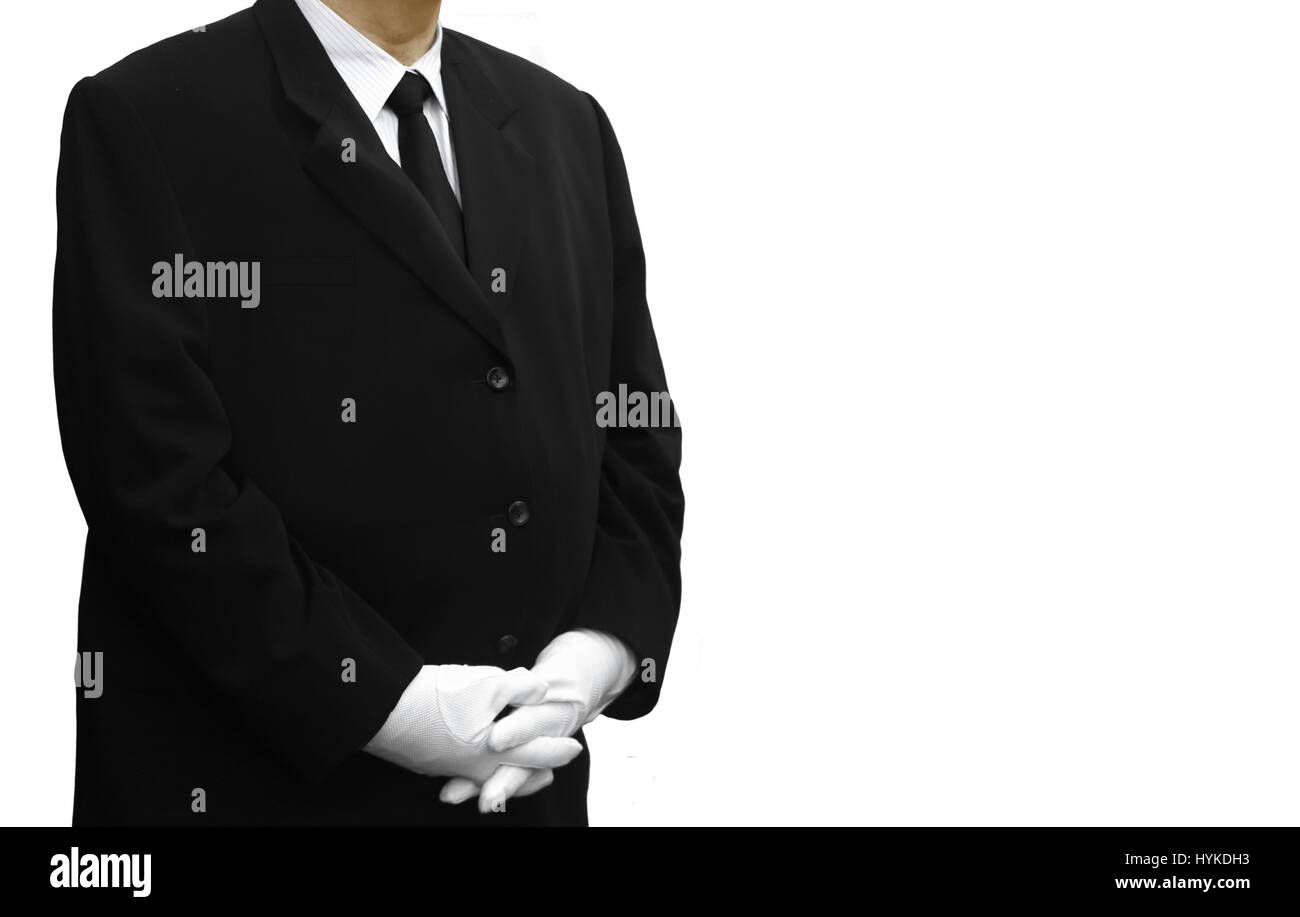 Man in black suit gloves hi-res stock photography and images - Alamy