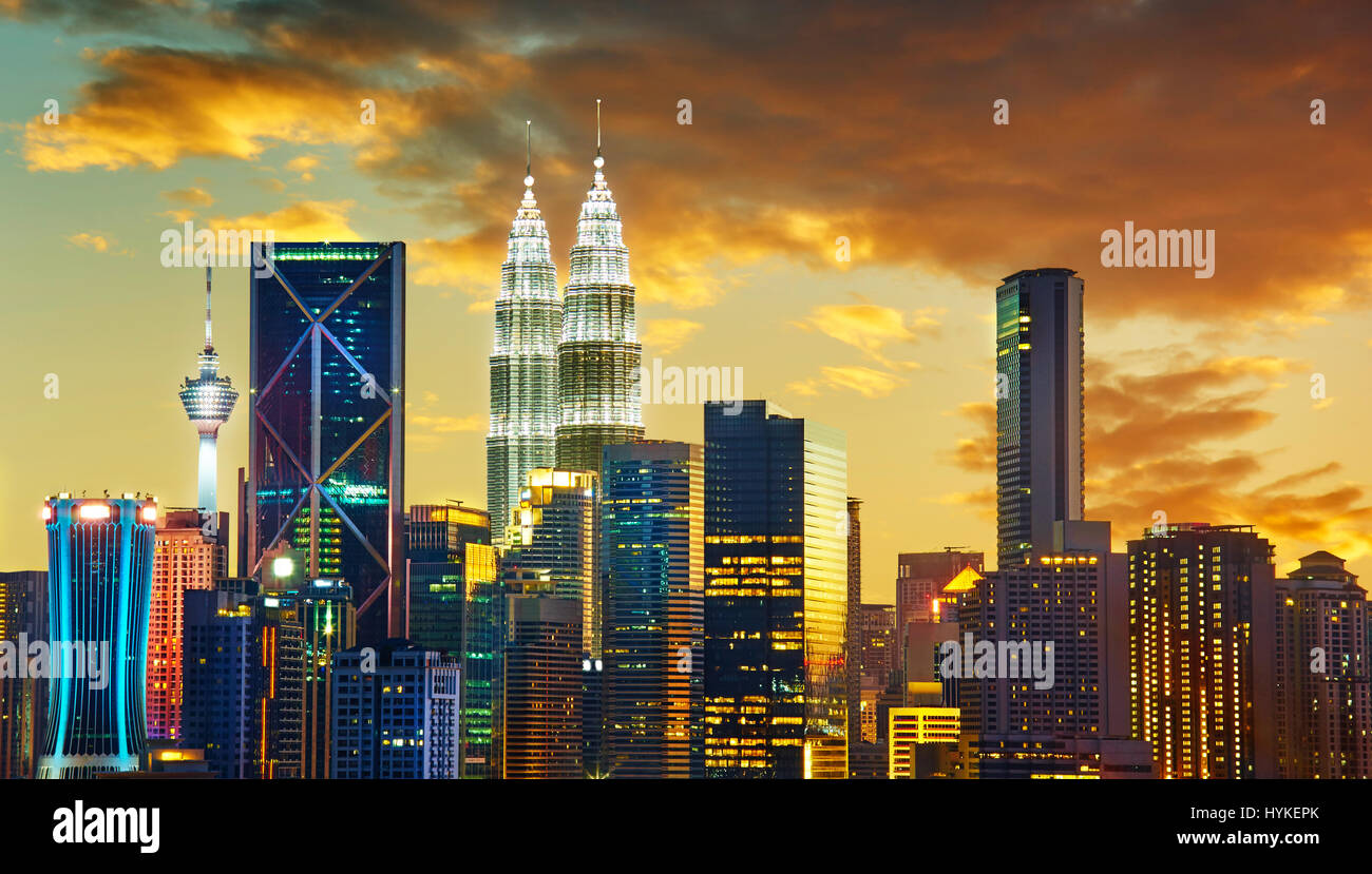 Kuala Lumpur City skyline with urban skyscrapers at sunset. Stock Photo