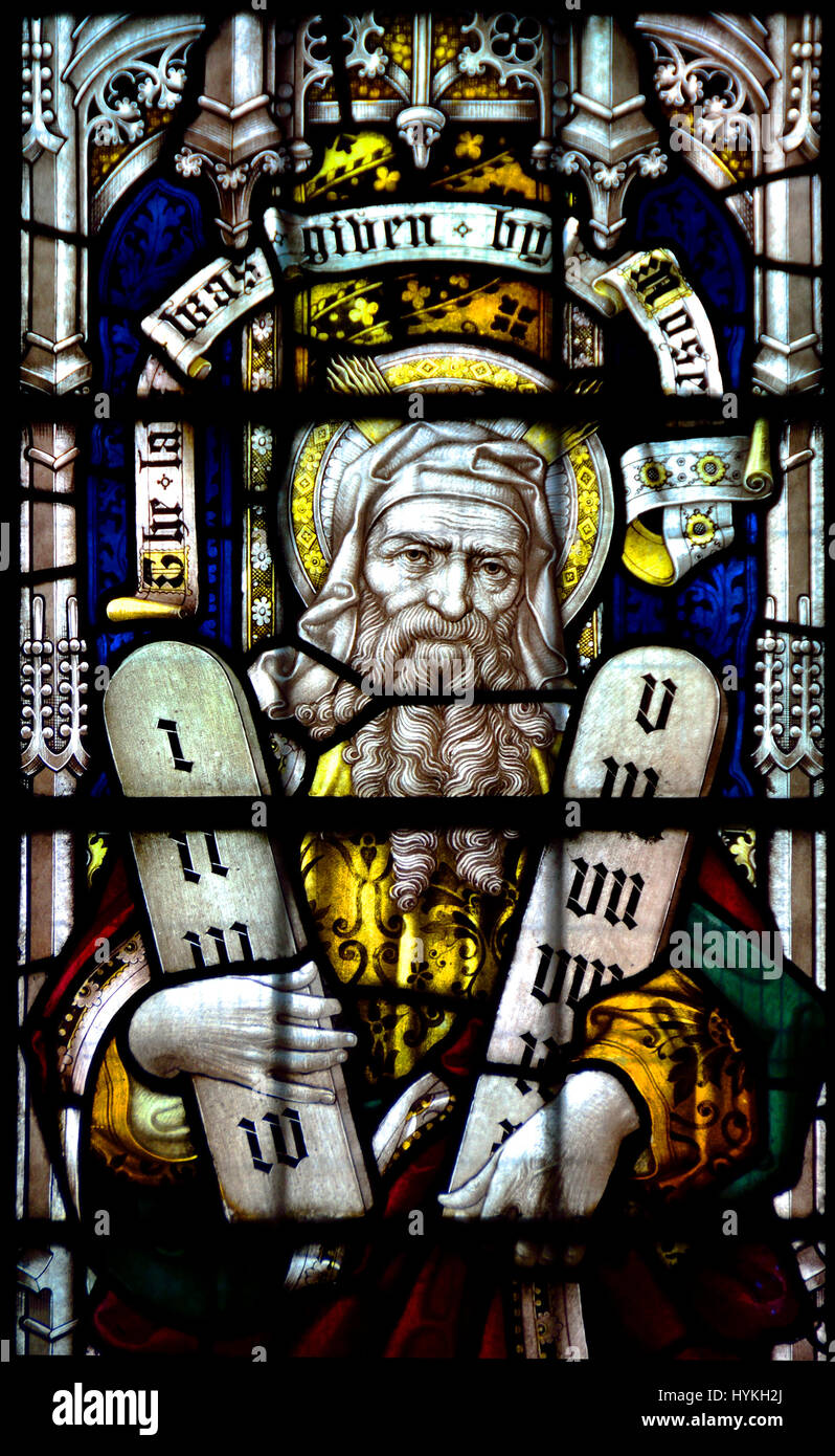 Faversham, Kent, England. St Mary of Charity parish church. Stained glass window: Moses with the Ten Commandments Stock Photo