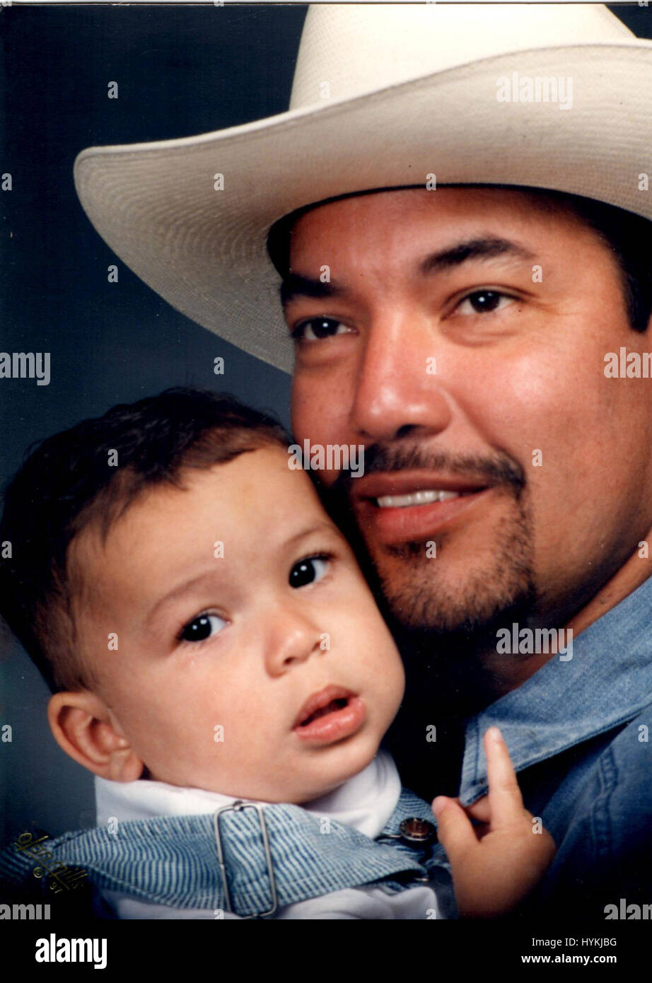 Houston, Texas, USA: Picture of Richard Hernandez and his son Marcos Hernandez in April 1997. WELCOME to the world of the transgender former banker who claims to be the first and only person to have both ears cosmetically removed as part of her quest to become a DRAGON.  Born Richard Hernandez in Mobiltown, Maricopa County, Arizona, this fifty-five-year-old would-be dragon now known as “Tiamat” has taken on several personas and undergone multiple stages of transformations or ‘metamorphosis’ to arrive at her final reptilian destination. This “human-dragon” also had horns implanted on her forehe Stock Photo