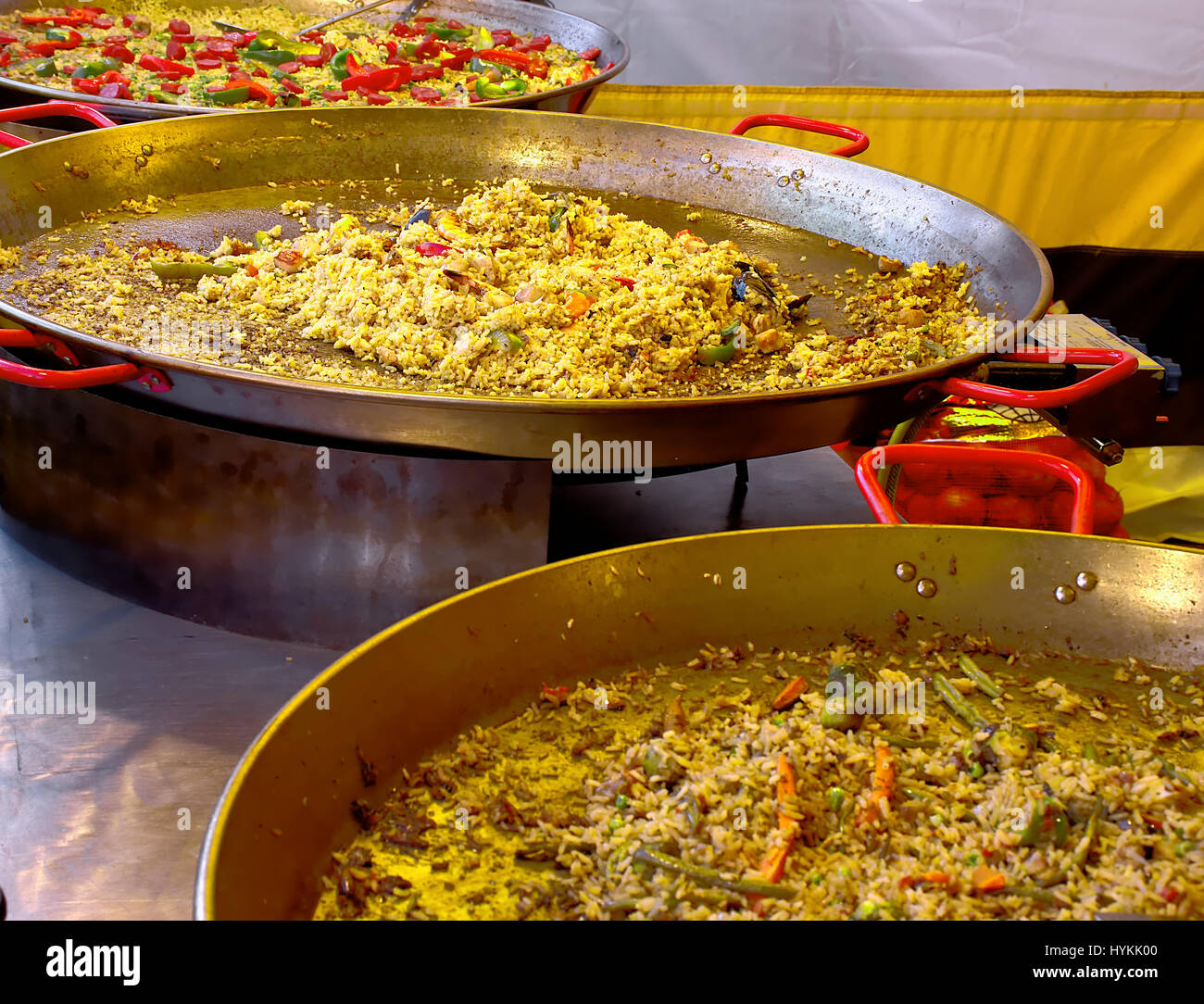 Pans with fried, traditional Spanish street food on British farmers