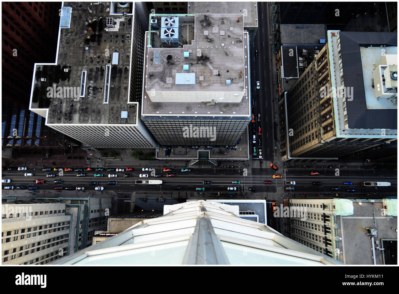 TORONTO, CANADA: A BRAVE urban explorer has captured jaw-dropping images from the top of 800-foot tall skyscrapers. Pictures show how as the sunsets this urban explorer climbs cranes and penetrates buildings in a bid to take the most stomach-churning pictures possible from the ever growing skyscrapers popping up in his booming hometown. A Toronto photographer named Dave who goes by the alias Freaktography has spent the last three years documenting the rise of his home-city, which is experiencing an unprecedented boom in tall building construction, with over 20 towers of over 460-feet having be Stock Photo