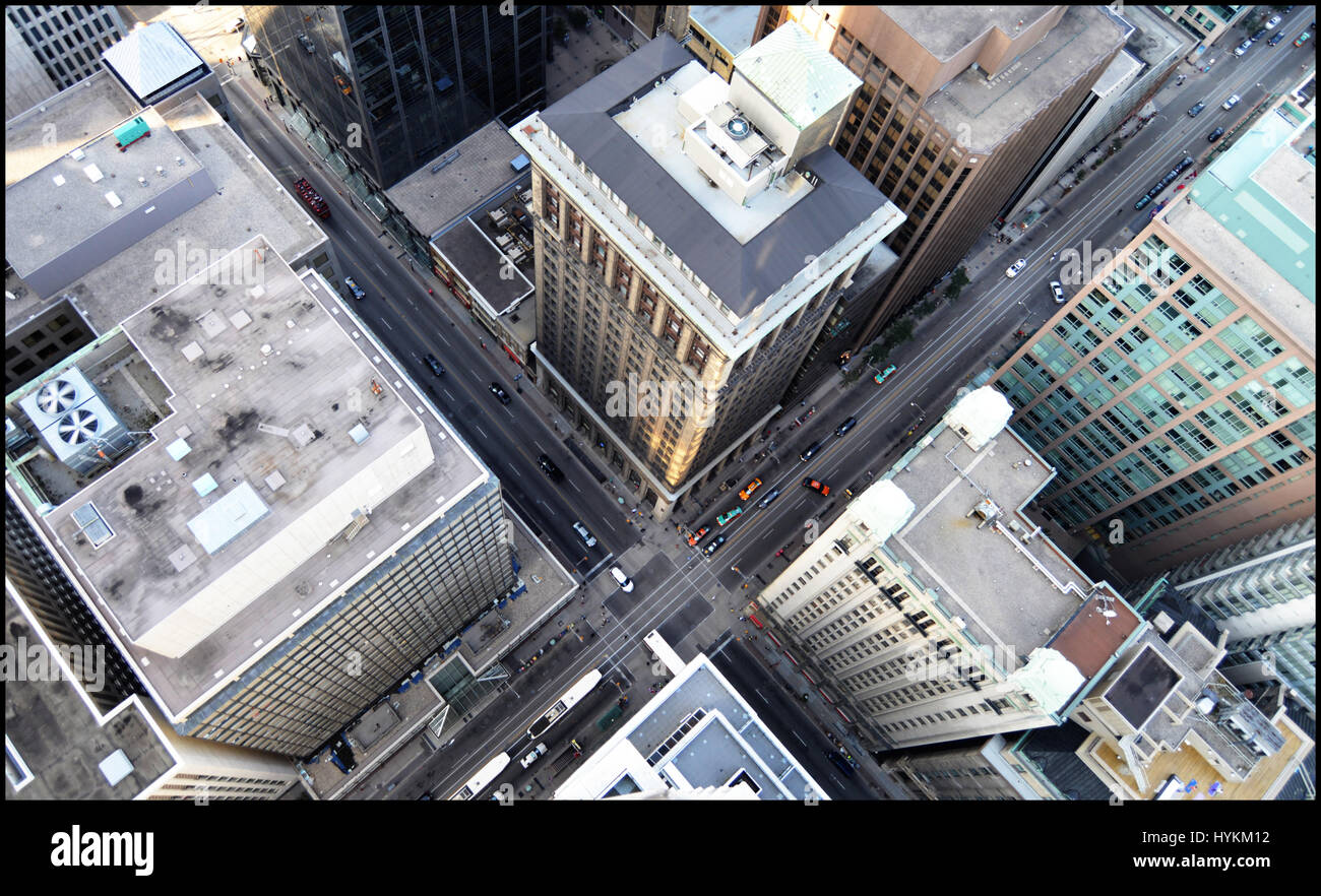 TORONTO, CANADA: A BRAVE urban explorer has captured jaw-dropping images from the top of 800-foot tall skyscrapers. Pictures show how as the sunsets this urban explorer climbs cranes and penetrates buildings in a bid to take the most stomach-churning pictures possible from the ever growing skyscrapers popping up in his booming hometown. A Toronto photographer named Dave who goes by the alias Freaktography has spent the last three years documenting the rise of his home-city, which is experiencing an unprecedented boom in tall building construction, with over 20 towers of over 460-feet having be Stock Photo