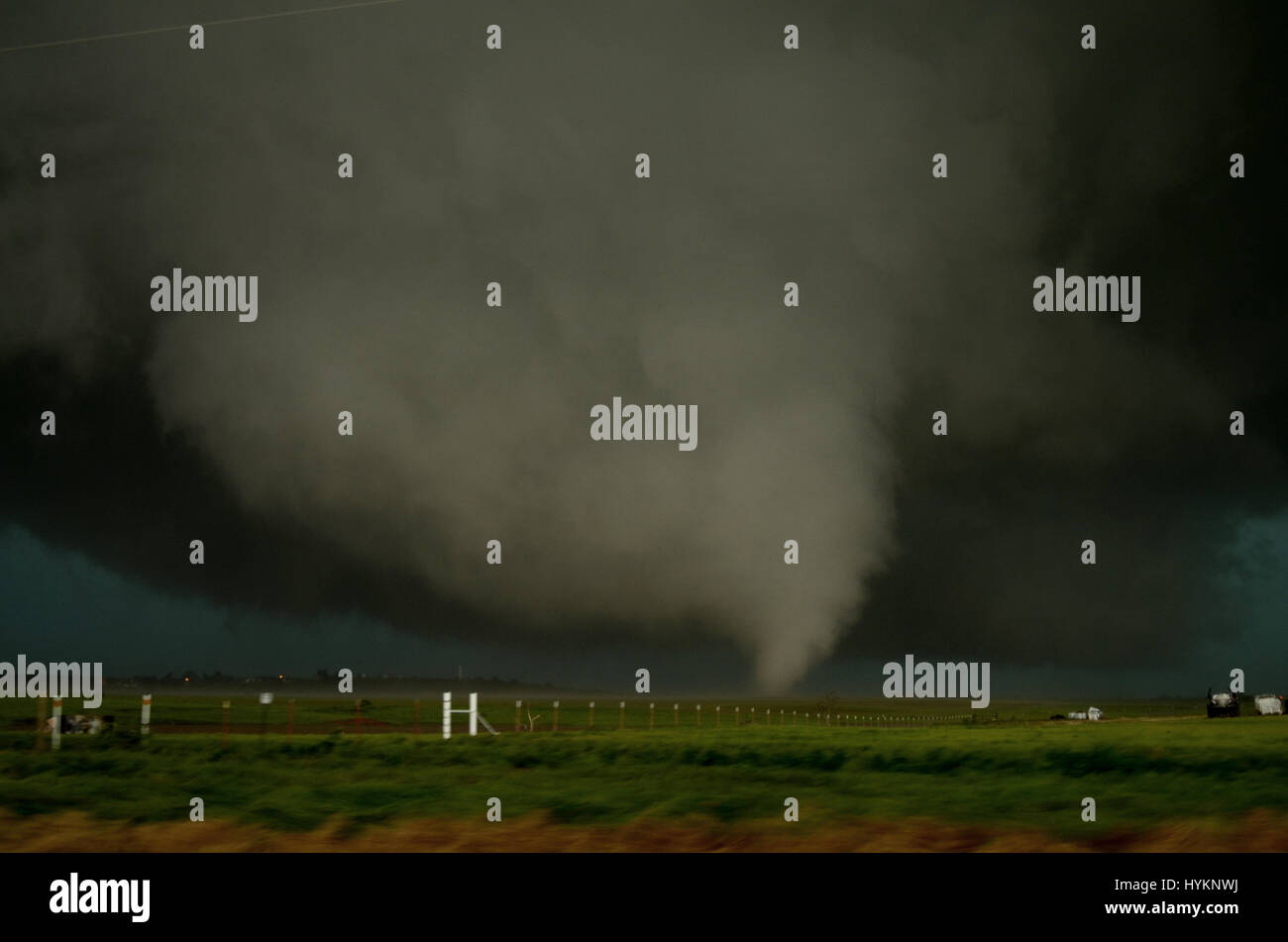 TORNADO ALLEY, USA: El Reno tornado. THE DEADLIEST weather events have been captured on camera by one lightning quick photographer. Incredible photographs show extreme weather from America’s Tornado Alley, renowned for the frequency of its storms. From terrifying lightning bolts to all-encompassing tornados, these pictures manage to capture to ferocity and atmosphere of these natural phenomena. Stock Photo