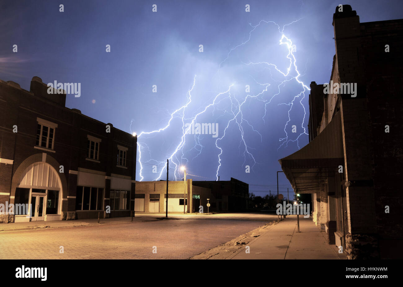 TORNADO ALLEY, USA: Quanah, Texas. THE DEADLIEST weather events have been captured on camera by one lightning quick photographer. Incredible photographs show extreme weather from America’s Tornado Alley, renowned for the frequency of its storms. From terrifying lightning bolts to all-encompassing tornados, these pictures manage to capture to ferocity and atmosphere of these natural phenomena. Stock Photo