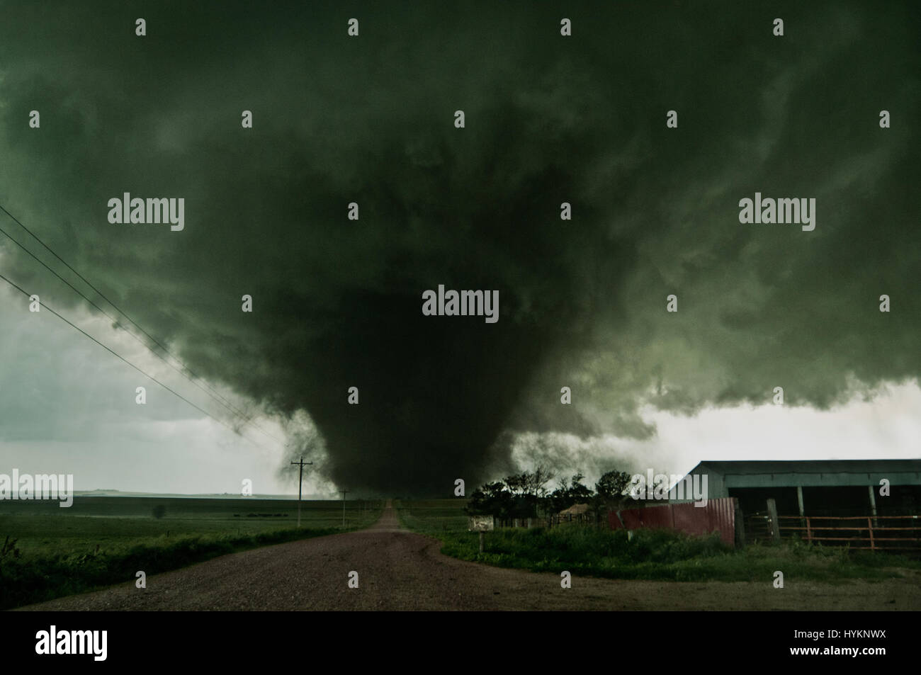 TORNADO ALLEY, USA: Coleridge, Nebraska. THE DEADLIEST weather events have been captured on camera by one lightning quick photographer. Incredible photographs show extreme weather from America’s Tornado Alley, renowned for the frequency of its storms. From terrifying lightning bolts to all-encompassing tornados, these pictures manage to capture to ferocity and atmosphere of these natural phenomena. Stock Photo