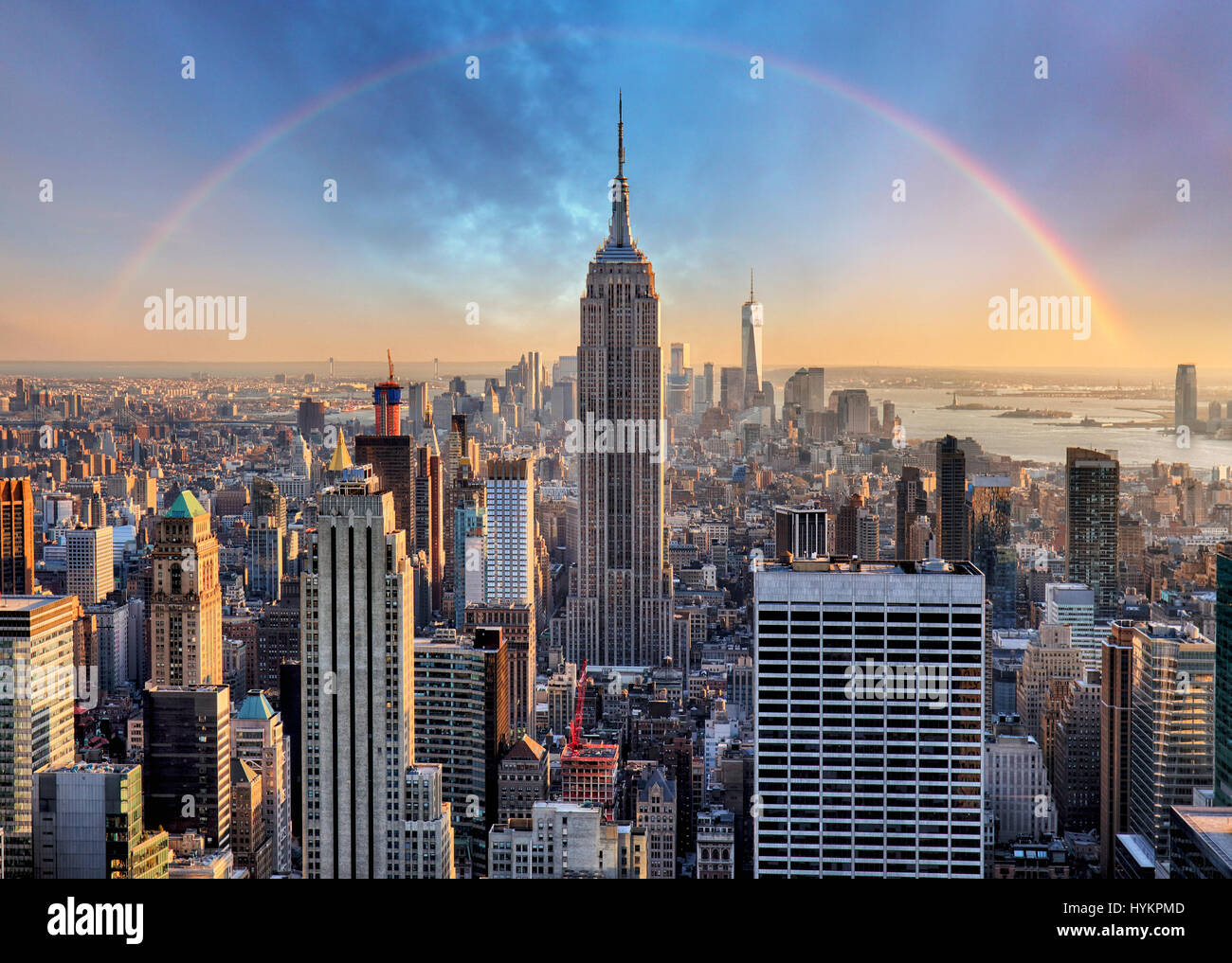 New York City skyline with urban skyscrapers and rainbow Stock Photo ...