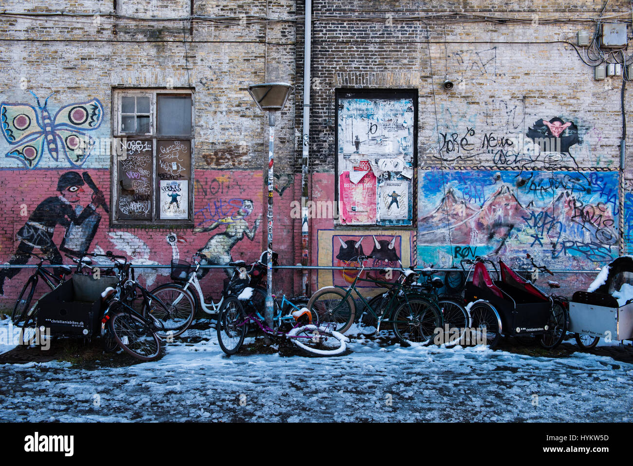 Bikes and graffiti in Christiania, Copenhagen Stock Photo