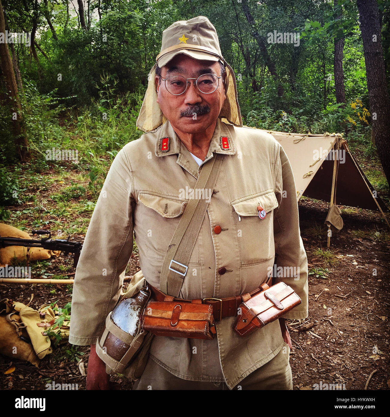 First Class Private in Imperial Japanese Army @ 2015 WWII Days – Lockport, IL. A WW2 OBSESSIVE has spent more than £30,000 to travel 64,000 miles around the world on a mission to document the quirky world of war re-enactment. The eye-popping snaps show WW2 fans in a variety of authentic uniforms from the era including Nazi Luftwaffe officers, RAF pilots and American paratroopers.  Other images show the real life war veterans who attend these events including a US Marine who witnessed the famous flag raising at Iwo Jima and a Polish holocaust survivor. The pictures were taken by American advert Stock Photo