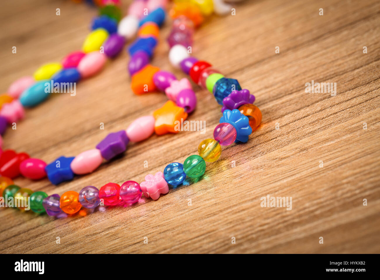 Mixed loose wooden beads for making jewellery Stock Photo - Alamy