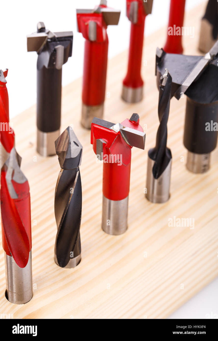 various shapes drill bits for wood on wooden stand. close-up Stock Photo