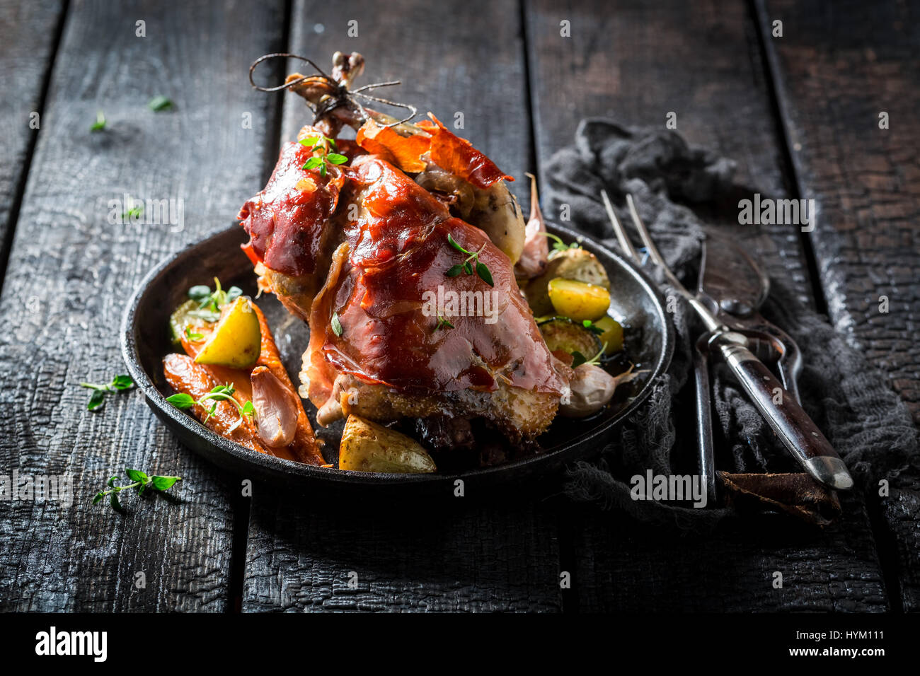 Grilled pheasant with bacon and spices and vegetables Stock Photo - Alamy