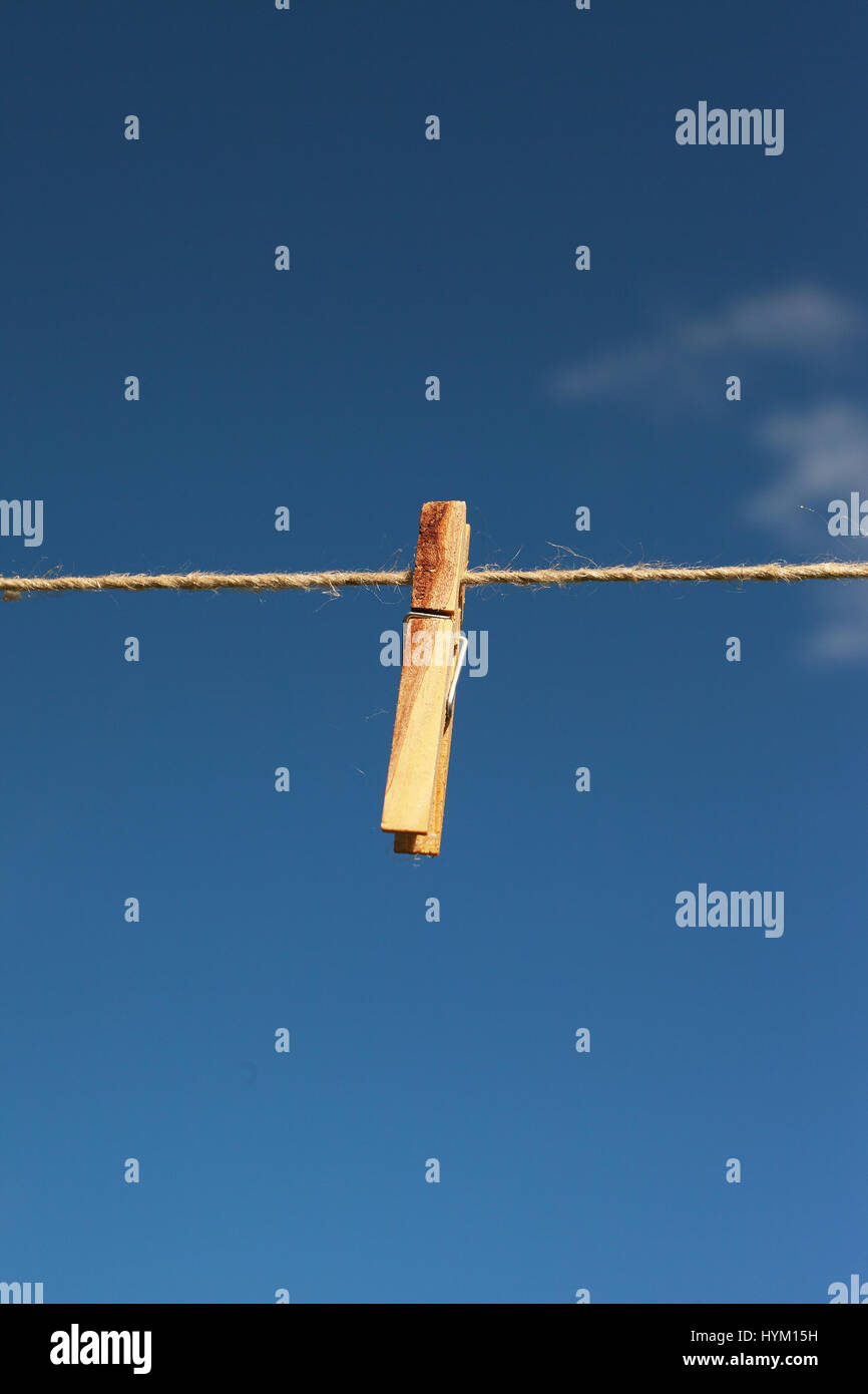 Clothespin on string Stock Photo - Alamy