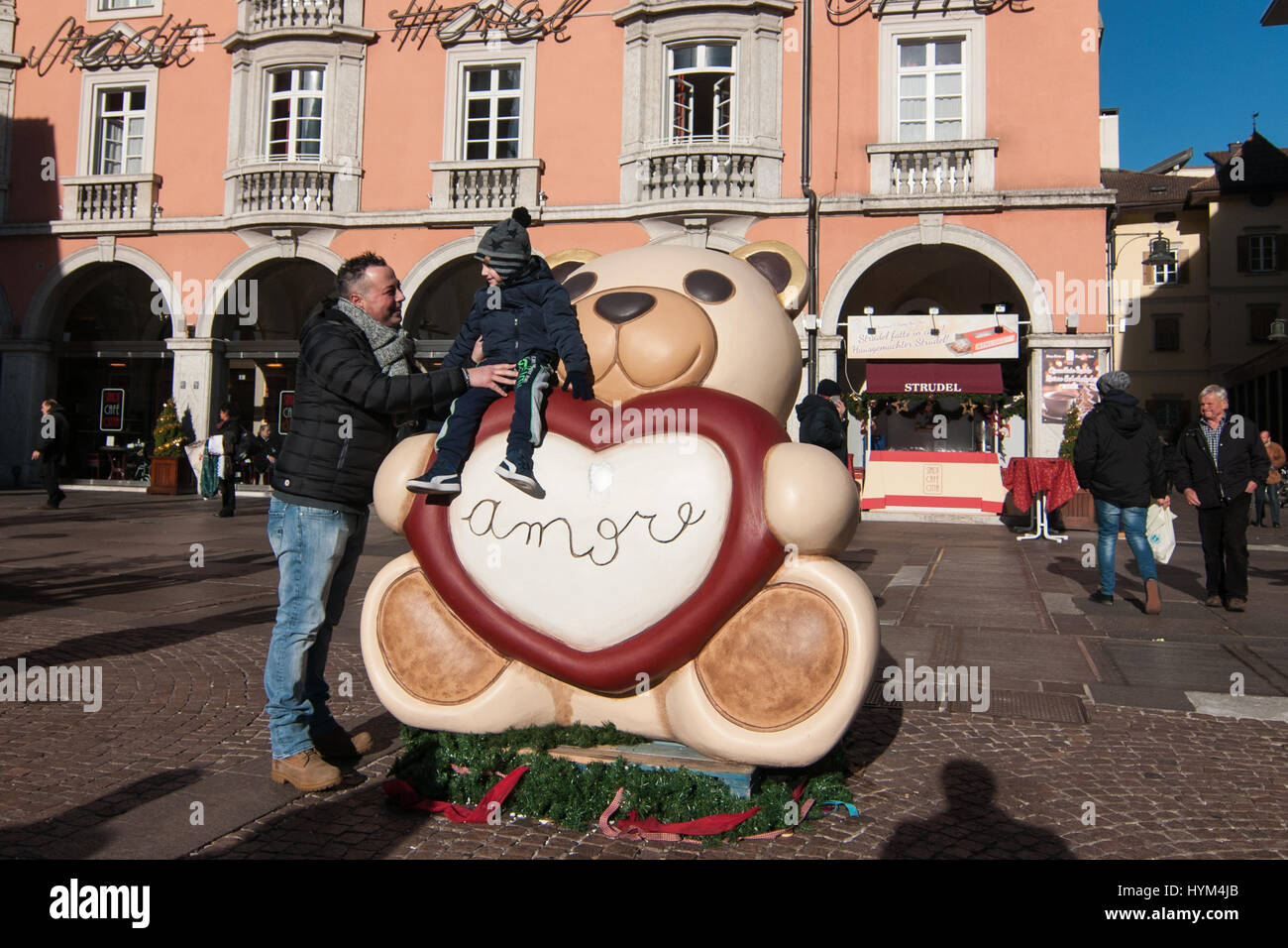 Visitors attend at the traditional Christmas markets of Bolzano, in Italy. Stock Photo