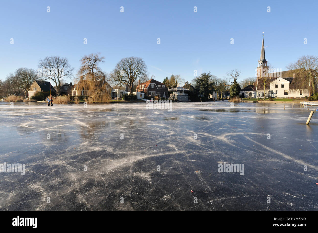 a frozen lake in the village Broek in Waterland, the Netherlands Stock Photo