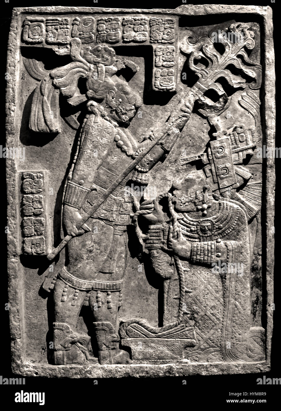 The Yaxchilan Lintels - Lintel 24 Bloodletting ritual performed by the king of Yaxchilan, Shield Jaguar II and his wife, Lady K'ab'al Xook. The king holds a flaming torch over his wife, who is pulling a thorny rope through her tongue. Classic Maya 723-726 ( The Mayans - Maya civilization was a Mesoamerican civilization in Yucatán  Mexico and Belize in Central America ( 2600 BC - 1500 AD ) Pre Columbian American  ) Stock Photo