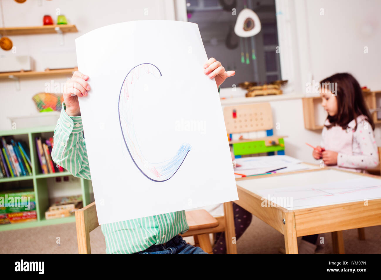 Preschoolers learn letters Stock Photo Alamy