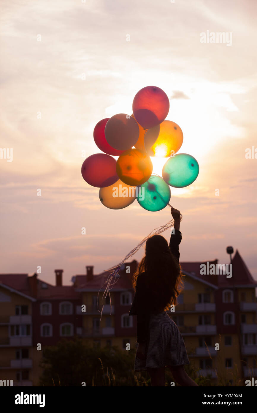 Girl with colorful balloons Stock Photo - Alamy