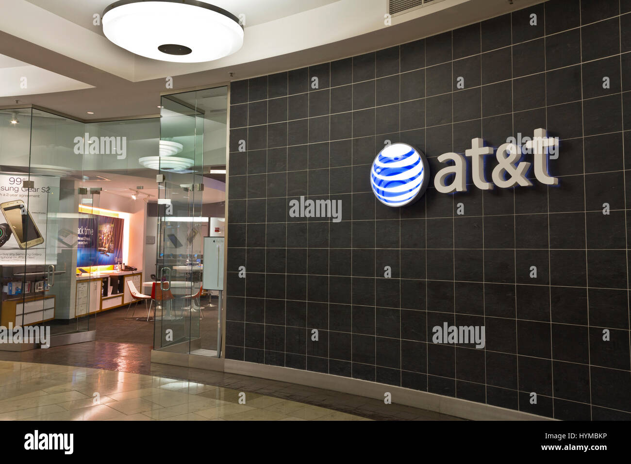 Indianapolis - Circa June 2016: AT&T Retail Store. AT&T Inc. is an American Telecommunications Corporation IX Stock Photo