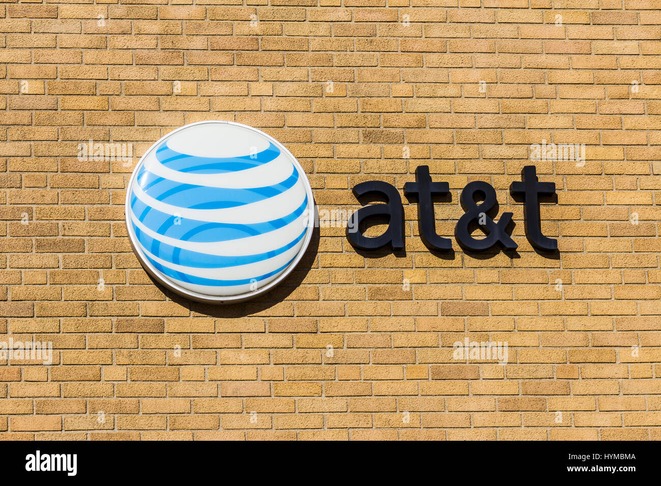 Kokomo - Circa November 2016: AT&T Corporate logo and signage on a downtown central office. AT&T now offers Uverse, VoIP, Cell Phones and DirecTV XIV Stock Photo