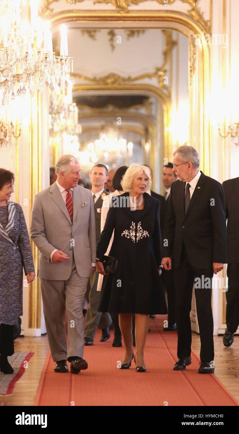 The Prince of Wales (second left) and the Duchess of Cornwall (centre) are greeted by the Federal President of the Republic of Austria Alexander Van der Bellen (right) and First Lady Doris Schmidauer (far left), at Hofburg Palace in Vienna on the eighth day of their European tour. Stock Photo