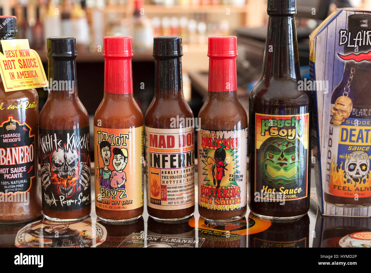 Hot, spicy, savory bottled sauces on display in a store in Key West, Florida, USA. Stock Photo