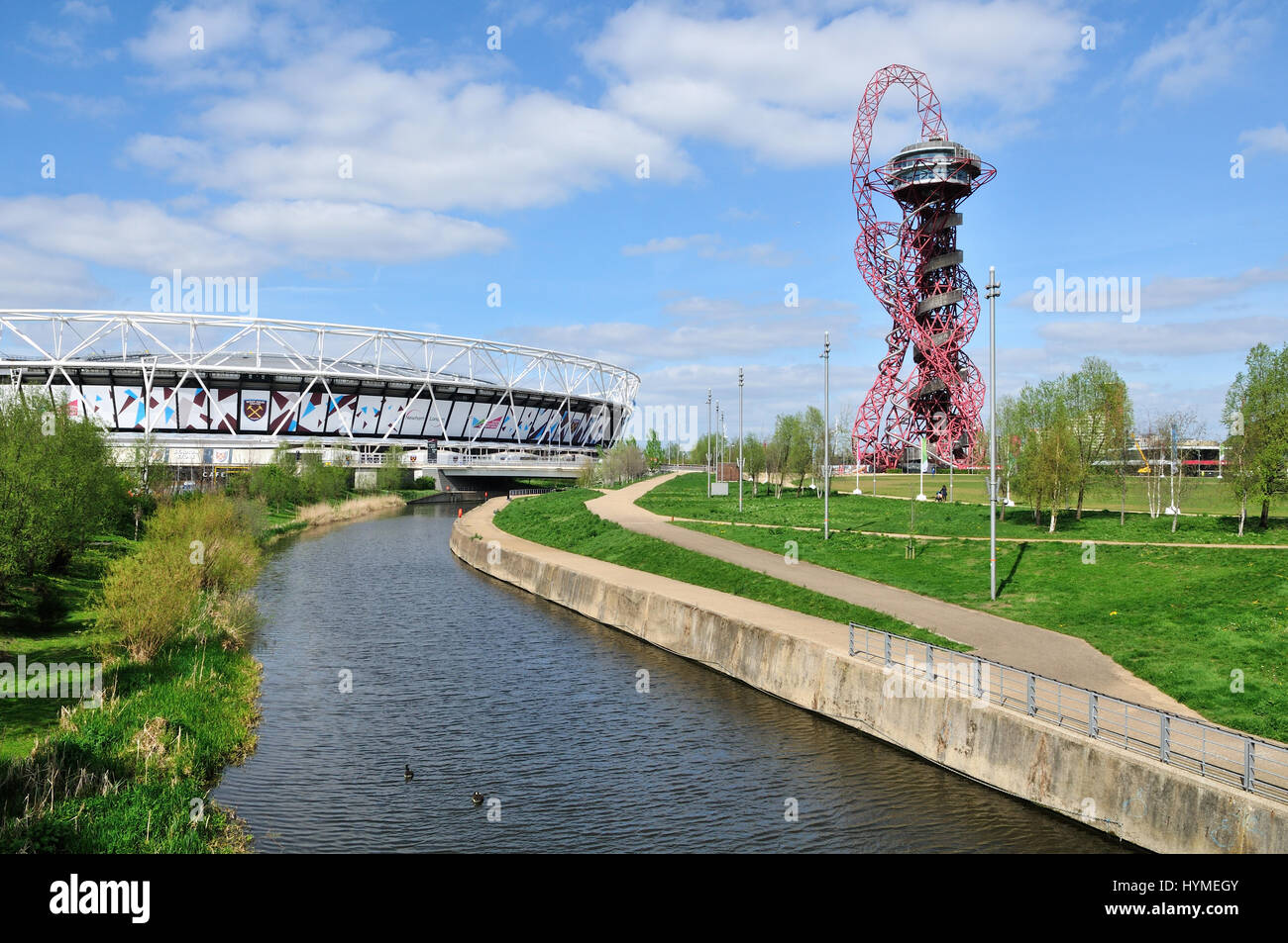 The London Stadium and City Mill River in the Queen Elizabeth Olympic Park at Stratford, East London UK Stock Photo