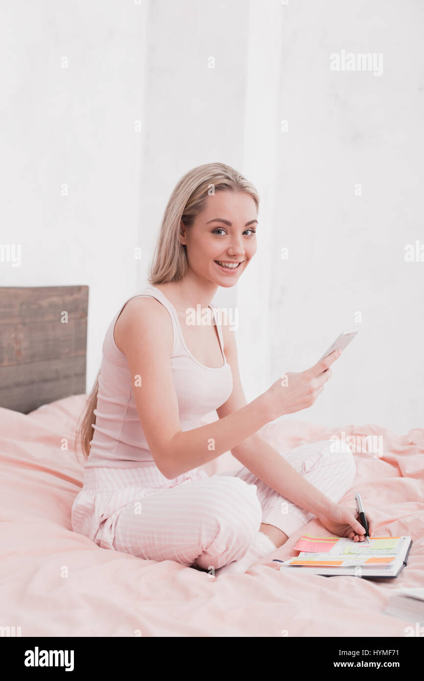 Young Woman Browsing Phone Concept Stock Photo