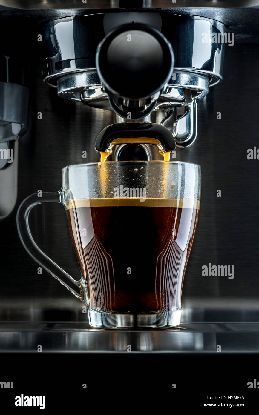 https://c8.alamy.com/comp/HYMF75/traditional-pump-espresso-coffee-machine-pouring-shot-into-transparent-HYMF75.jpg