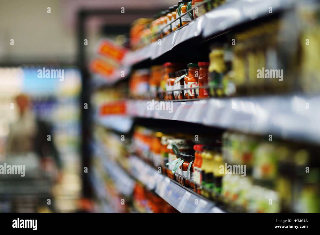 Woman shopping dairy product in grocery store Stock Photo - Alamy