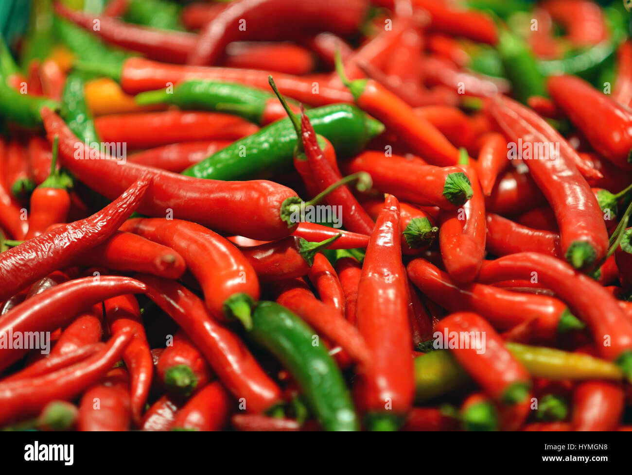 Red and green chili peppers at the background Stock Photo Alamy