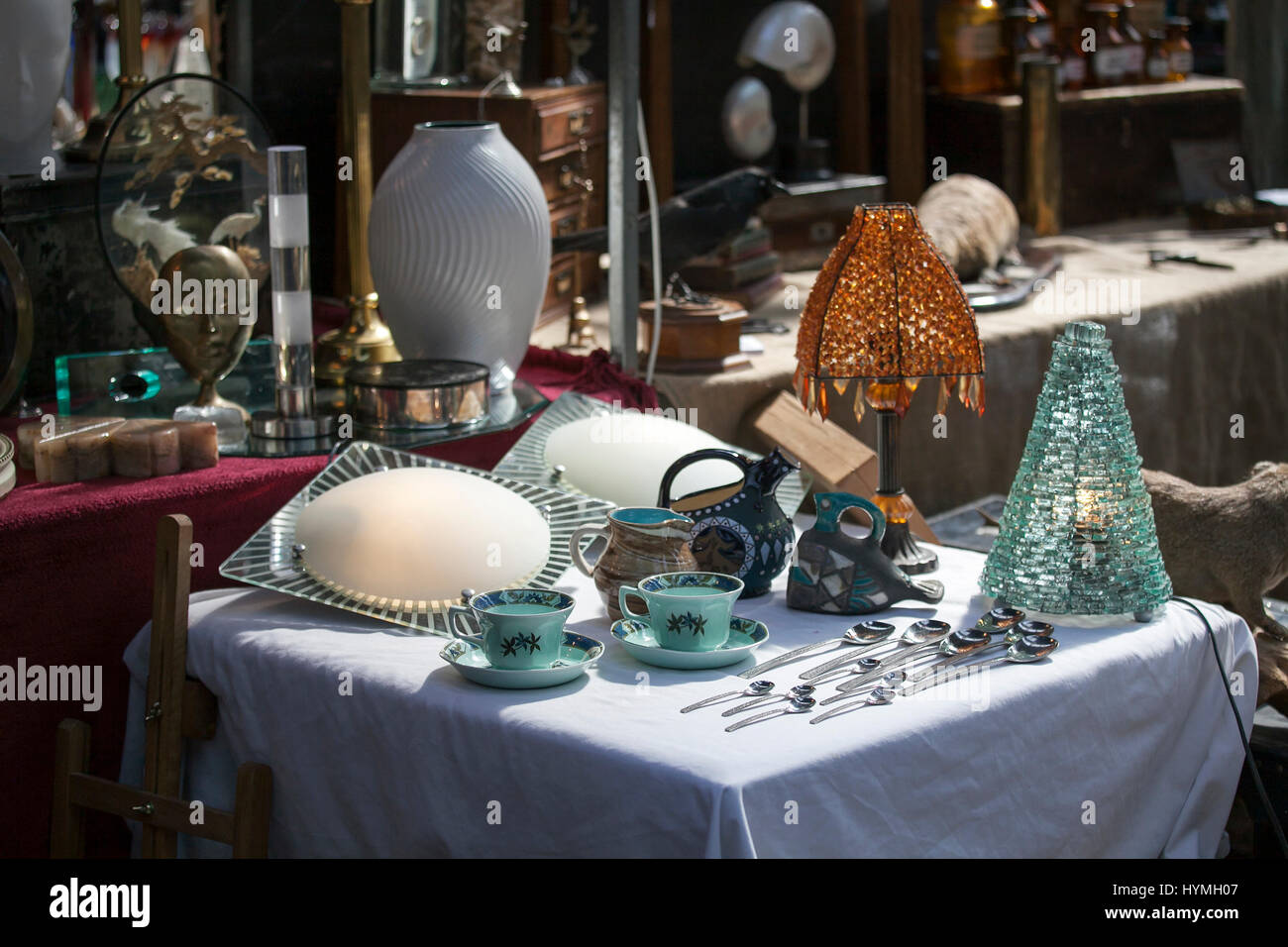 LONDON, ENGLAND - March 30, 2017 Lamps, cups and spoons and other things on the Spitalfields market near Liverpool Street subway. Stock Photo