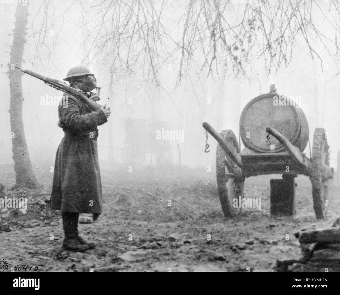 American sentinel on guard with gas mask to protect against German gas attack. 1918, France. Stock Photo