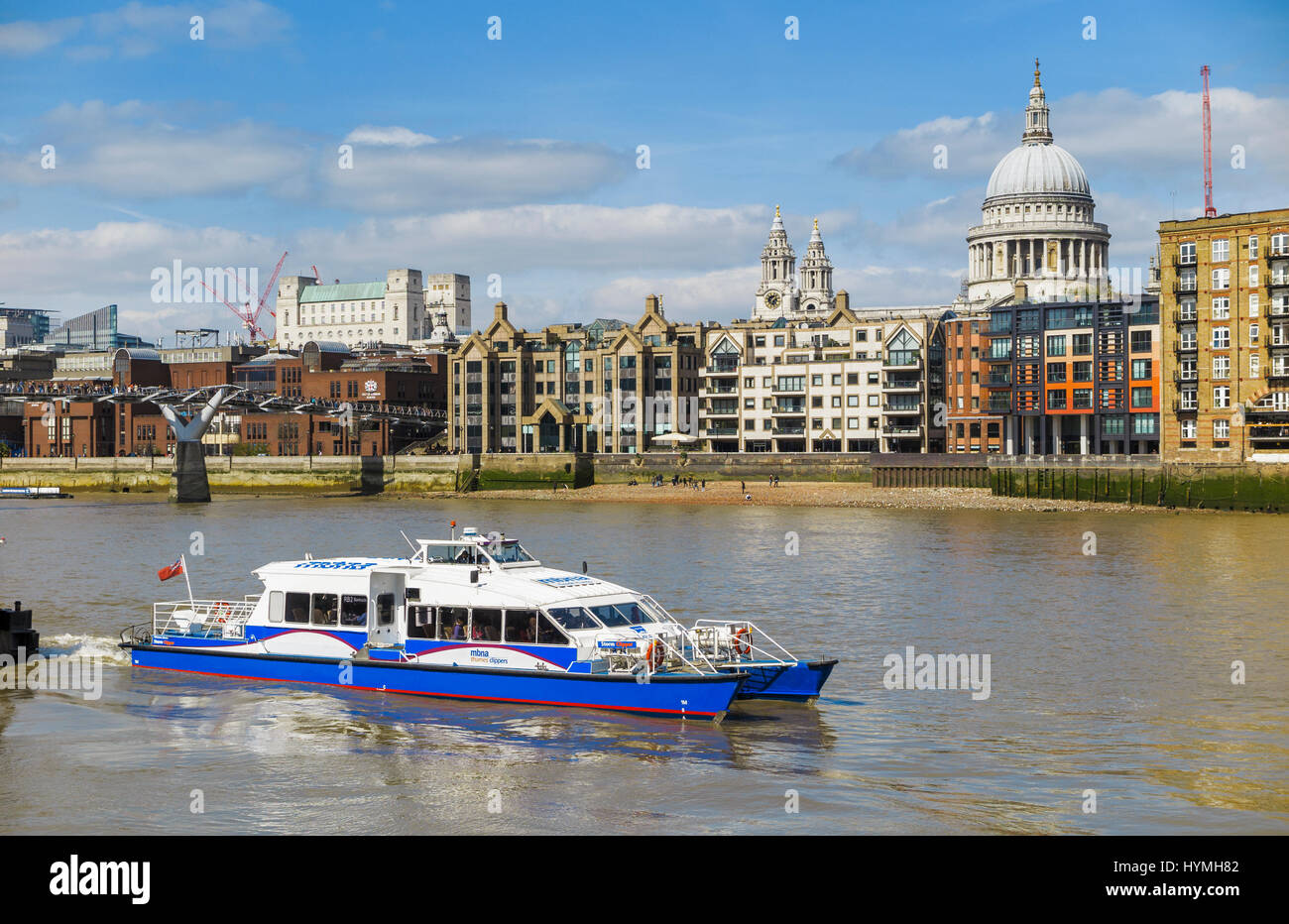 Blue and white Catamaran Thames Clipper boat, part of the river bus ...