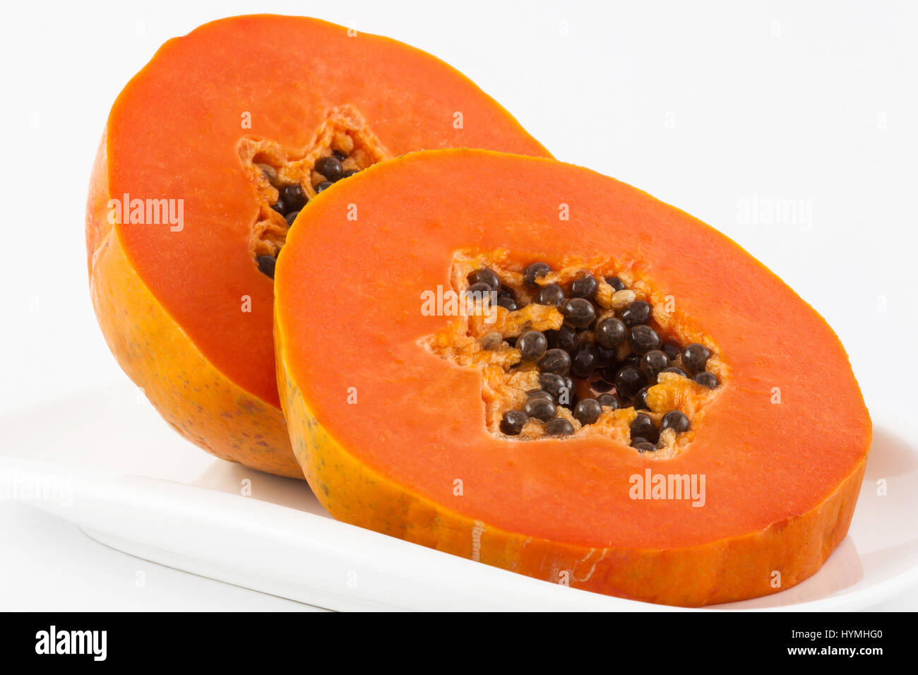 Tropical fruit called papaya (Carica papaya) on white background Stock
