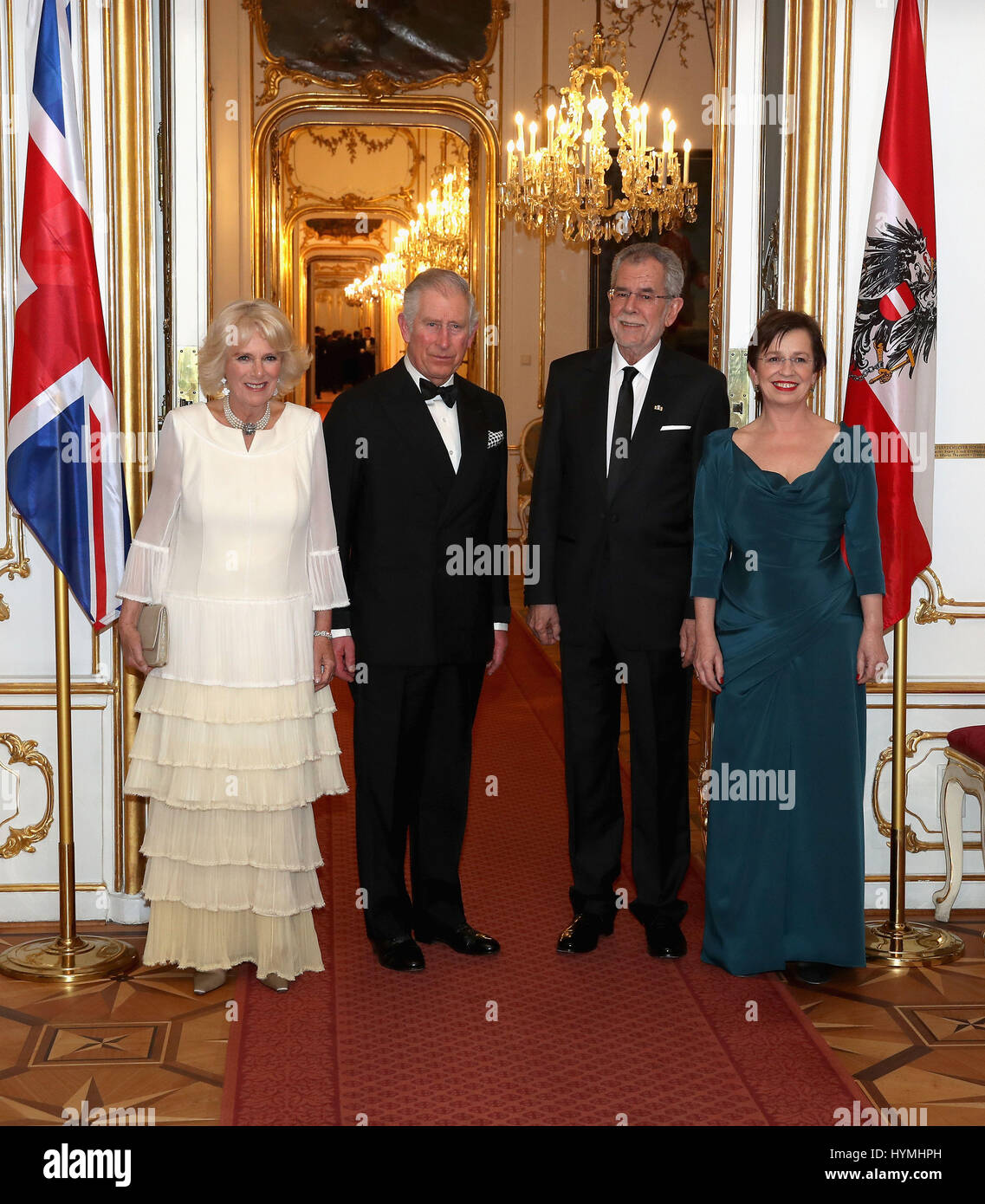 The Prince of Wales and the Duchess of Cornwall (left) are greeted by Federal President of the Republic of Austria Alexander Van der Bellen and First Lady Doris Schmidauer as they arrive at Hofburg Palace in Austria. Stock Photo