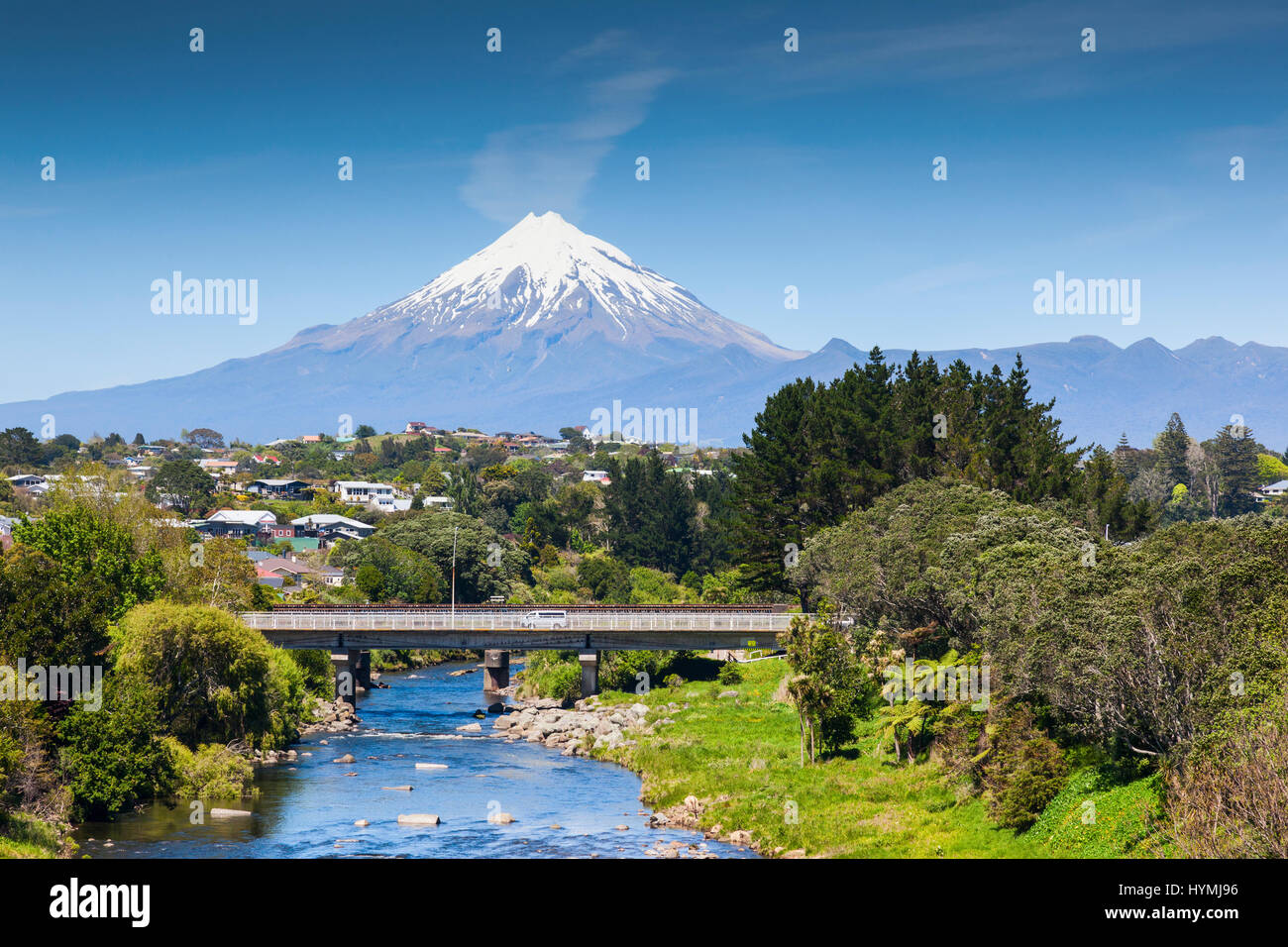 The Waiwhakaiho River, the city of New Plymouth, and Mount Taranaki, New Zealand. Stock Photo