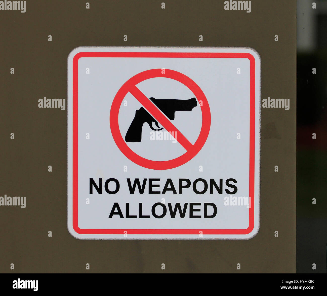 No weapons allowed sign on door Stock Photo