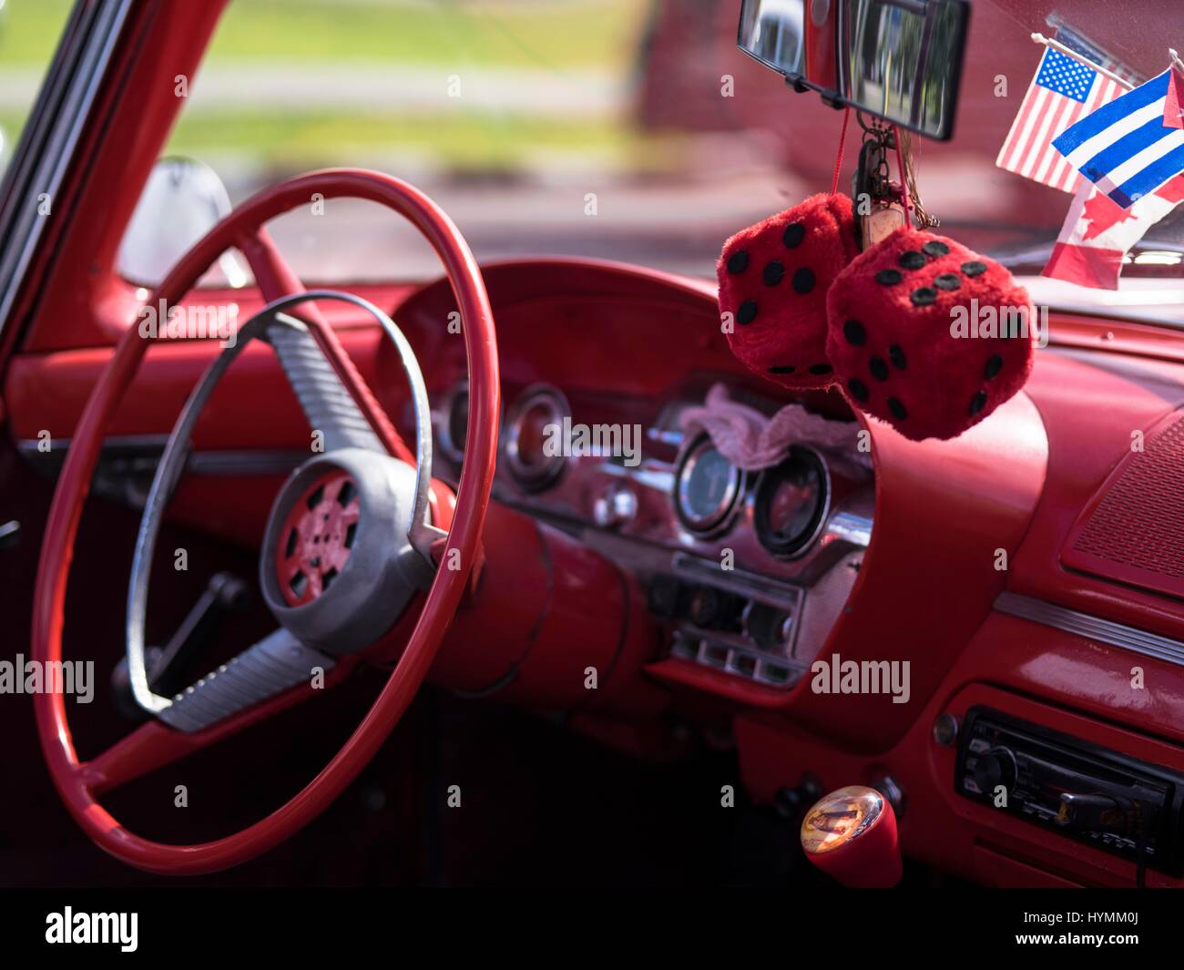 Old fashioned classic 1950s Ford Edsel American car in red colour with image of Che Guevara in Havana, Cuba Stock Photo