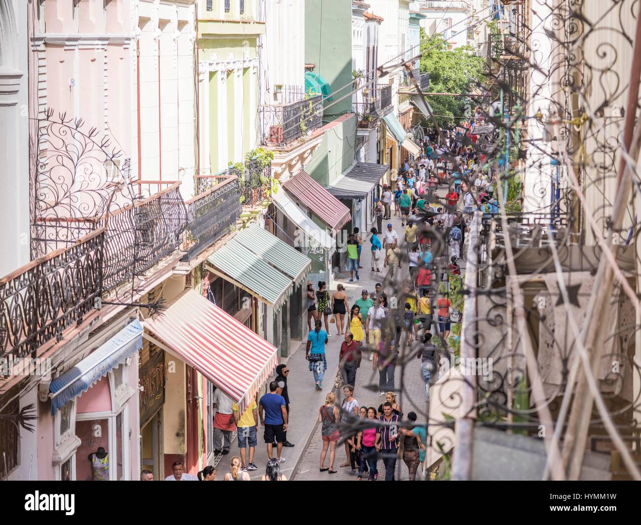 Crowded street with tourists, shoppers and local travellers at Calle Obispo (Bishop Street), Old Havana (La Habana Vieja), Cuba Stock Photo