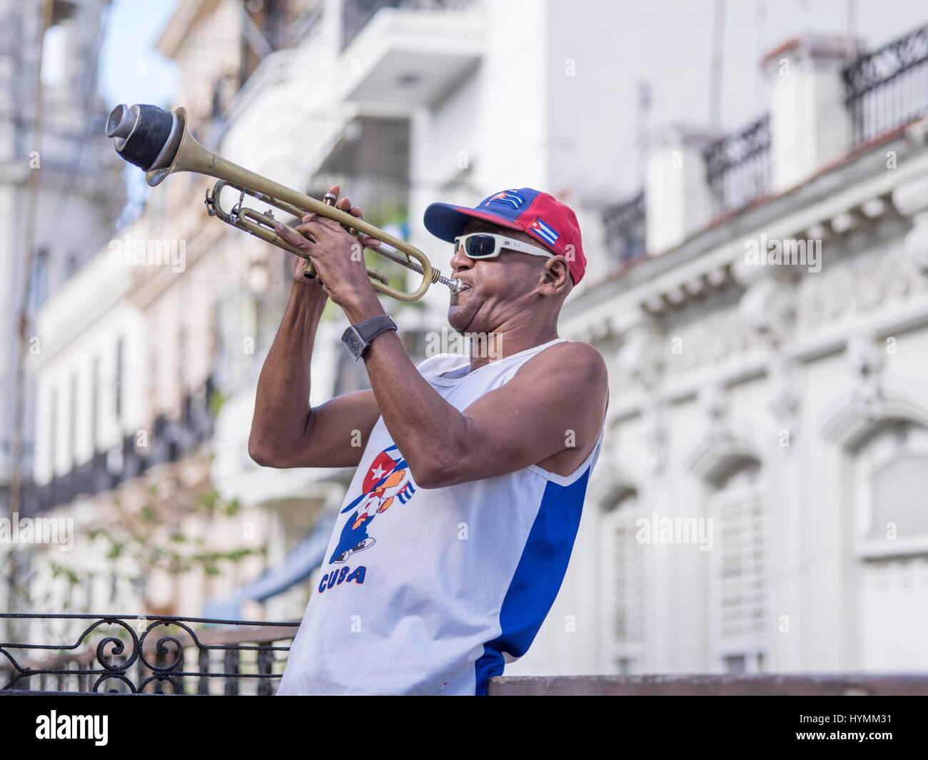 Cuban musician playing trumpet in Havana City, Cuba, West Indies, Central America Stock Photo