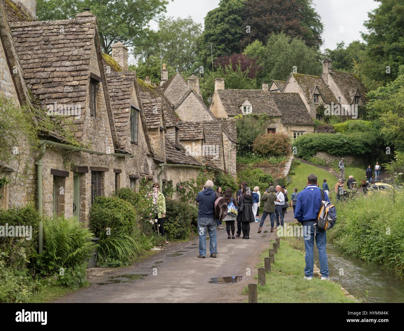 Beautiful cottages at Arlington Row in Cotswolds village of Bibury, Gloucestershire, United Kingdom Stock Photo