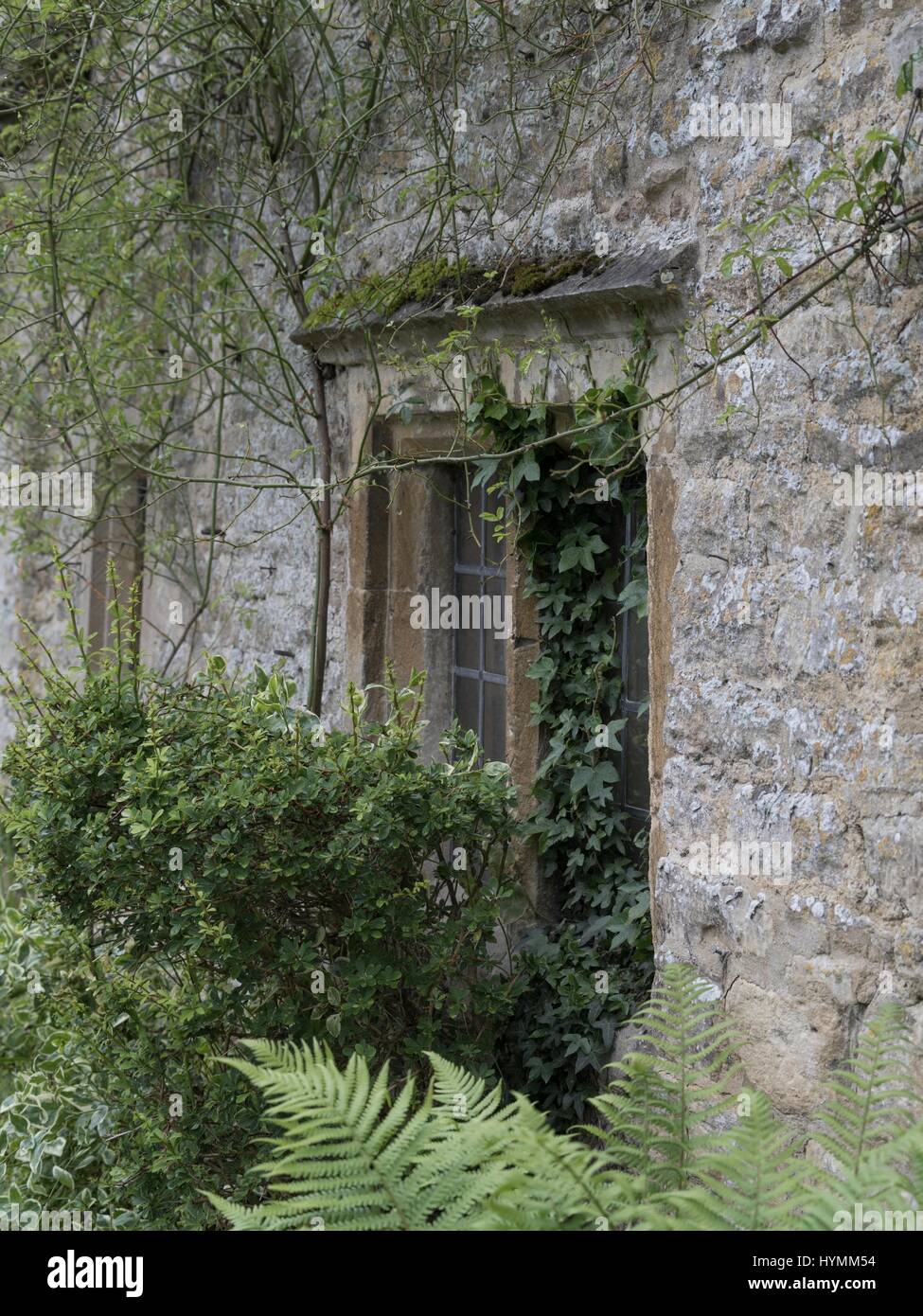 Beautiful cottages at Arlington Row in Cotswolds village of Bibury, Gloucestershire, United Kingdom Stock Photo