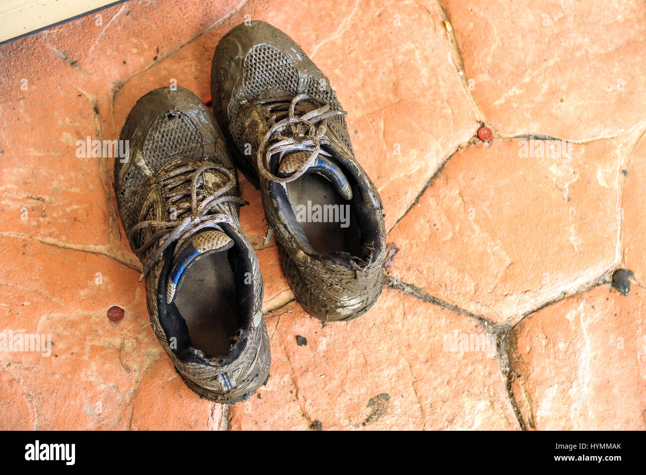 Mud covered shoes hires stock photography and images Alamy