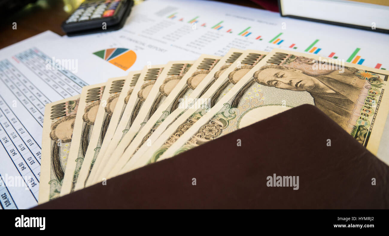 Statement report with money in financial concept Stock Photo