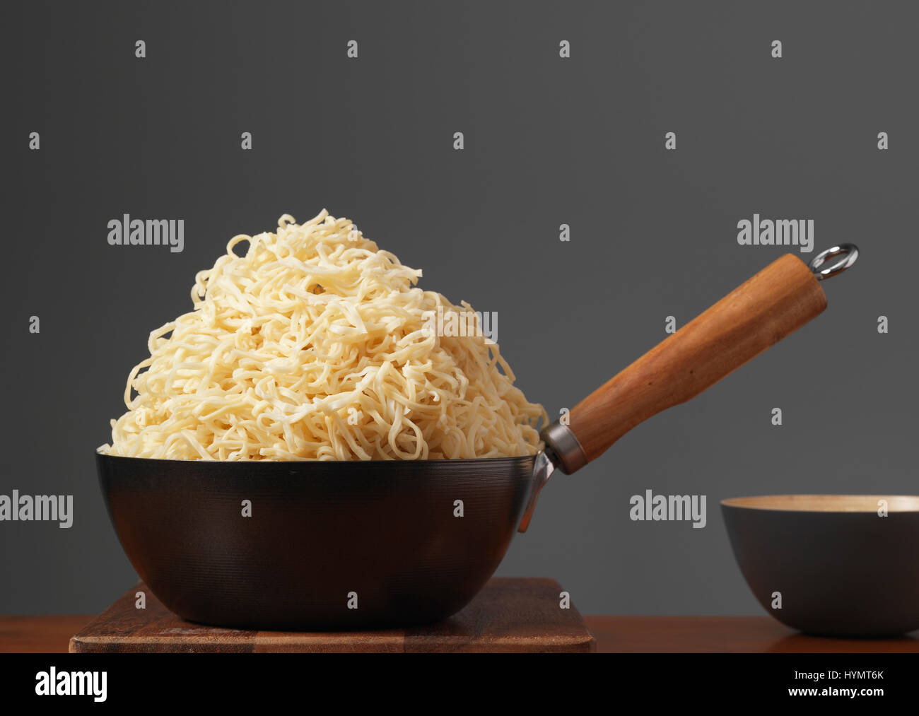 Overflowing bowl of Noodles Stock Photo