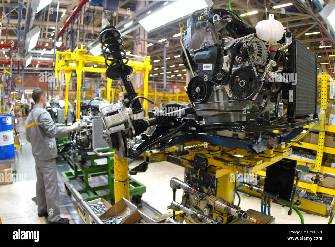 New manufactured engines on assembly line in a factory. Stock Photo