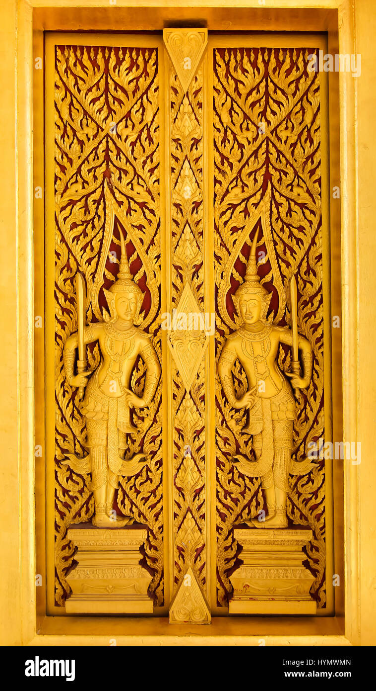 Ancient art Angel at the gate in Thai temple Stock Photo