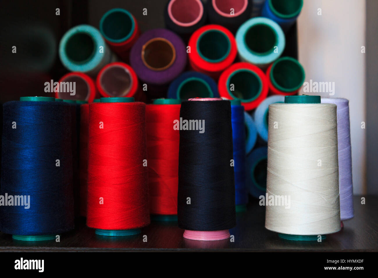 colored the threads in manufacturing garments Stock Photo