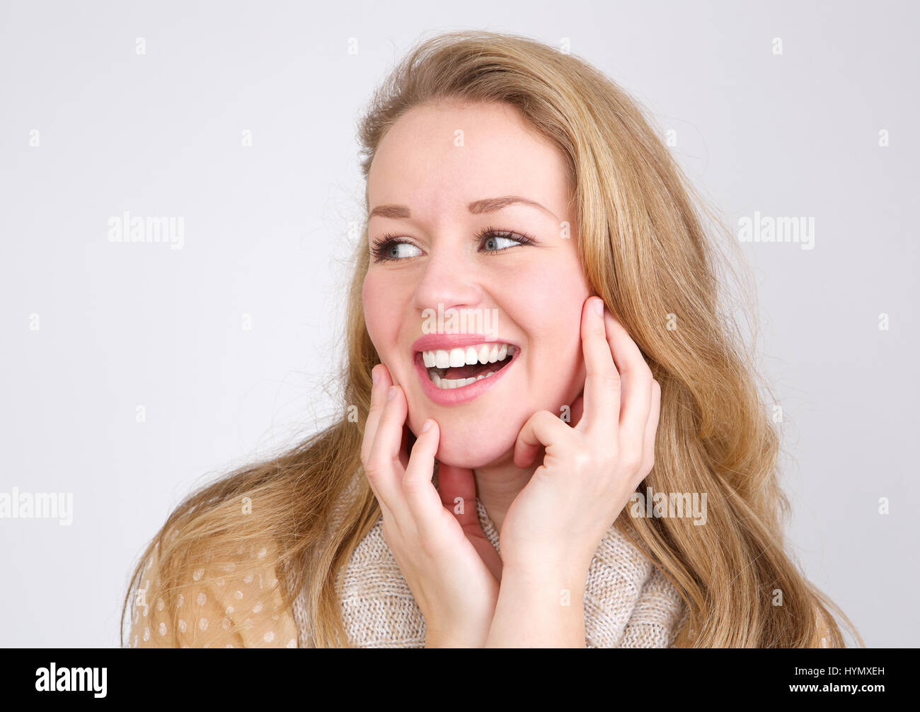Horizontal close up portrait of a laughing young woman Stock Photo - Alamy